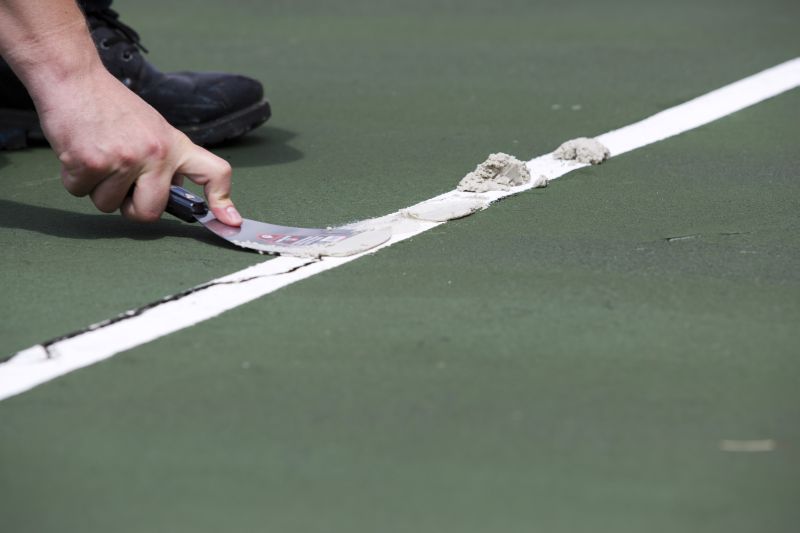How to Fix Cracks and Chips in Acrylic Court Surfaces